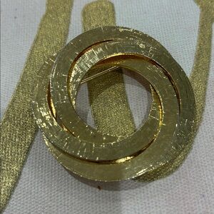 Chic Gold Circular Brooch